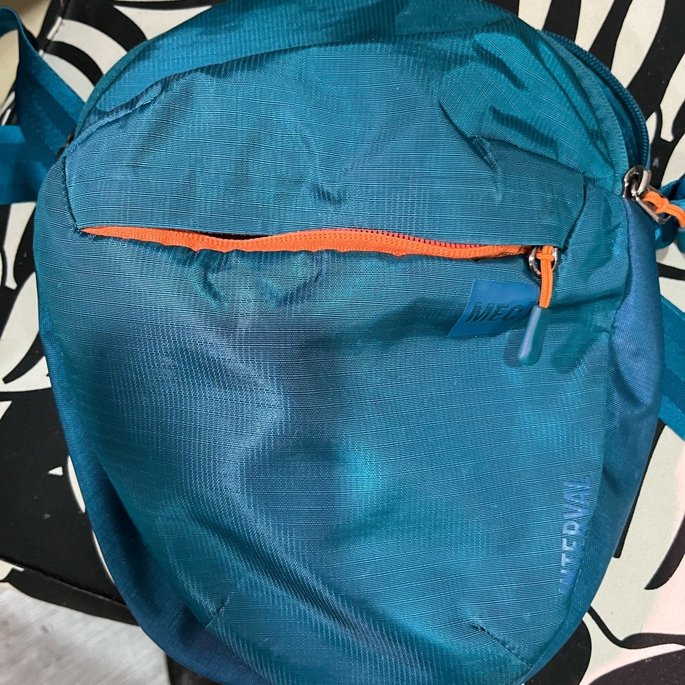 MEC “Interval” Blue and Orange Crossbody with Durable Fabric and Medium Size